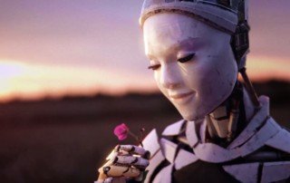 Female robot contemplates the beauty of a flower